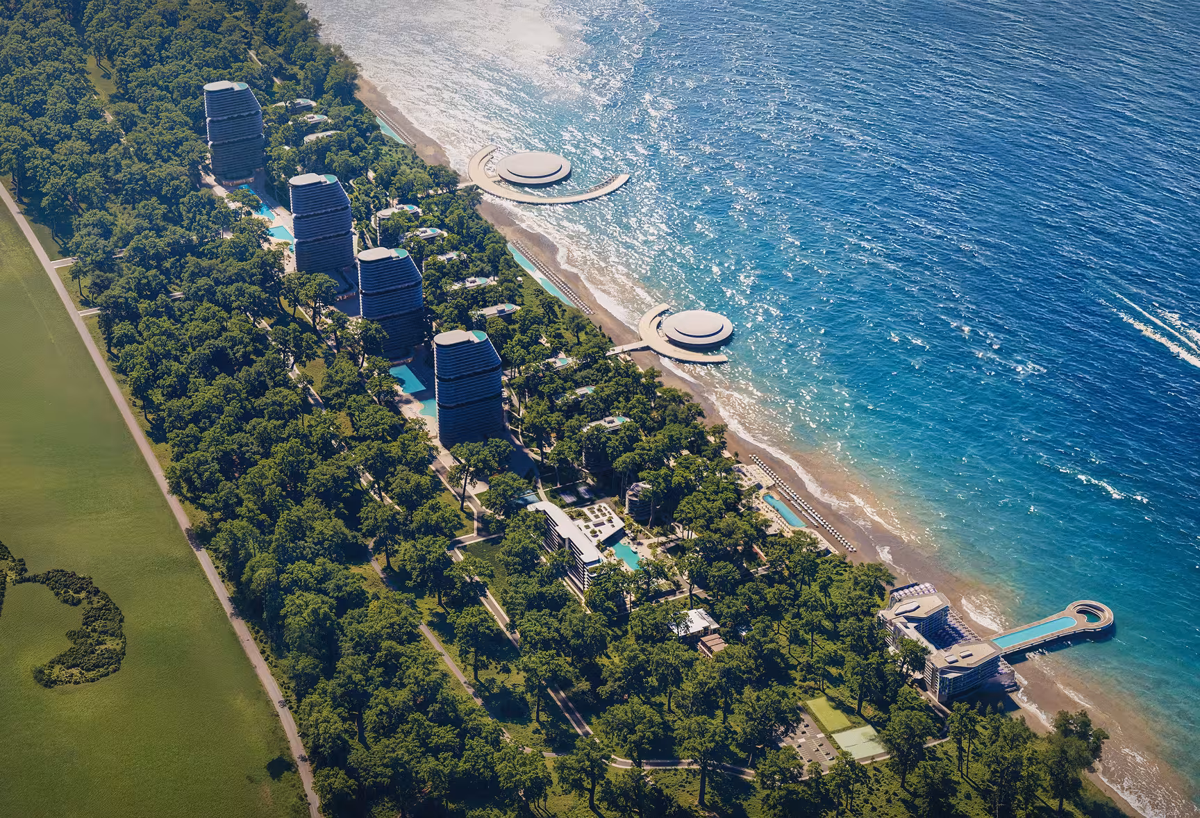 Aerial view of coastal towers beside forest and beach