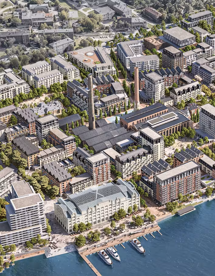 Aerial view of a master-planned green community with tree-lined streets